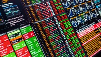 Computer screen close up showing stock exchange finance data financial markets stocks shares commodities credit default swaps CDS stock market news