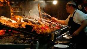 Meats cooked over wood barbecues at the Mercado del Puerto, Montevideo, Uruguay.