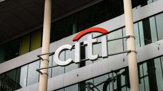 Citibank logo sign (citi) on the building exterior. Banking company as part of the Citigroup offering financial services in a multinational scale.