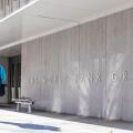 Man walks by a sign for The World Bank Group at their global headquarters in Washington, D.C.