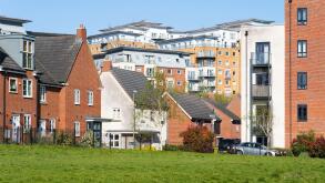Mixed terraced houses, semi detached housing and flats at Sinclair Drive and Winterthur Way in Basingstoke town centre, Basingstoke, Hampshire, UK