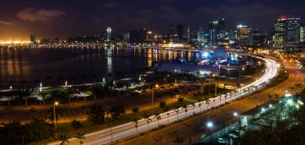 Skyline of capital city Luanda and its seaside during the night, Angola, Africa