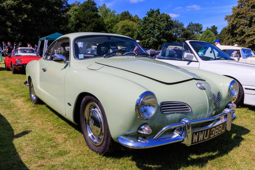 1971 Volkswagen Karmann Ghia at a classic car show in the Gnoll Country Park, Neath Port Talbot, Wales, UK