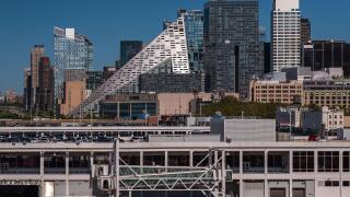 New York city, Manhattan landscape with unique shapes buildings named Hell's kitchen. Pier 88 in the foreground.