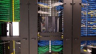 Ethernet cables and sockets neatly arranged in the server racks of a data center at some Hong Kong serviced offices.