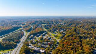 Aerial drone photo housing and fall foliage in Laurel Maryland USA