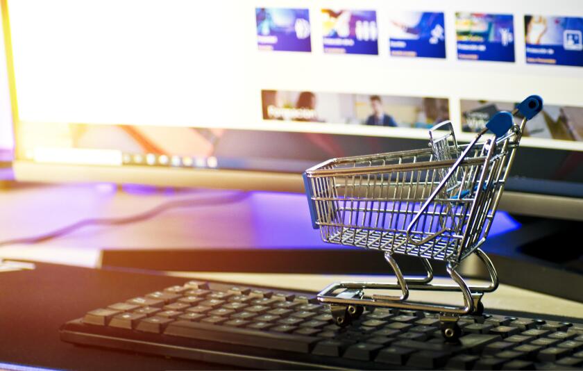 Shopping trolley on computer keyboard.jpg