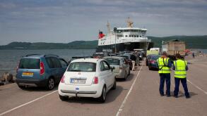 cars being loaded onto Caledoniann MacBrayne vessel 'MV Finlaggan' at Kennicraig Pier, West Loch Tarbert.