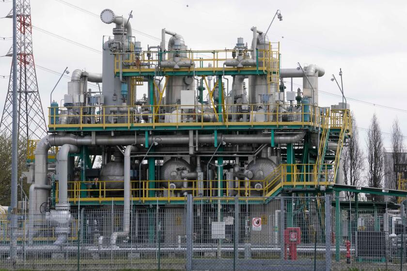 A view of the Snam factory gas storage plant, in Brugherio in Brugherio, Italy, Friday, April 1, 2022. (AP Photo/Luca Bruno)