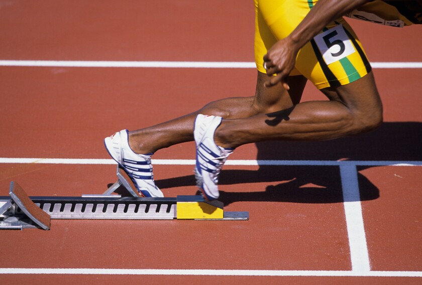 Sprinter taking off from the starting block