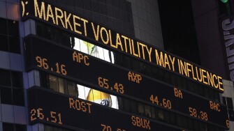 Illuminated stock market board in New York City