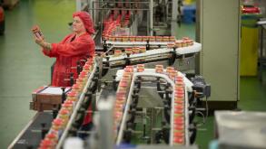 Peanut Butter Manufacturing production plant line in the family business factory floor of Duerr's Jams warehouse Wythenshawe, Manchester, England, UK.