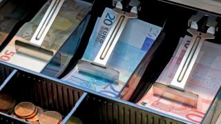 Euro bank notes and coins in a cash register, Stuttgart, Baden-Wuerttemberg