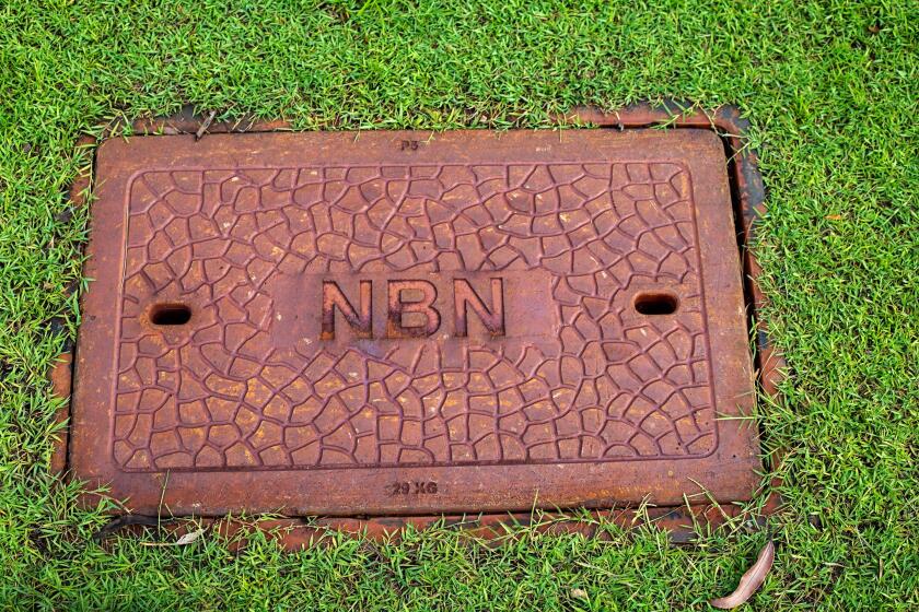 NBN wording on a new roadside pit of the Australian National Broadband Network hybrid coaxial fiber network augmentation