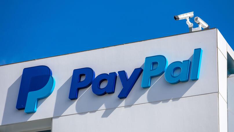 PayPal logo and sign at company headquarters building facade in Silicon Valley. PayPal Holdings Inc. is an American company operating a worldwide onli