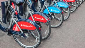 Cycle hire docking station with new bikes sponsored by Santander who are replacing Barclays as main sponsor.