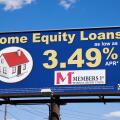 Billboard sign advertising home equity loans via Members 1st Federal Credit Union.