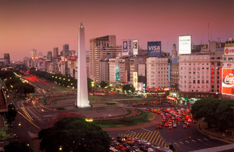 Avenida 9 de Julio at dusk in Buenos Aires with Obelisk and traffic