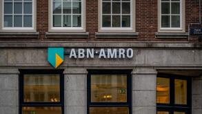Amsterdam, Netherlands - August 26, 2018: Brand name logo ABN AMRO bank on local branch office in Amsterdam