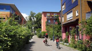 Cyclists in the largely car-free sustainable suburb of Vauban, Freiburg im Breisgau, Germany.