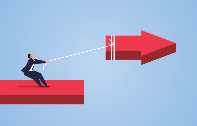Businessman uses the rope to pull back the broken arrow