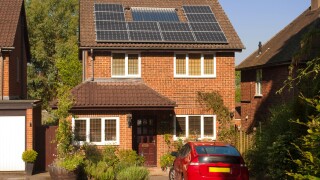 Solar panels on house roof with regenerative energy system