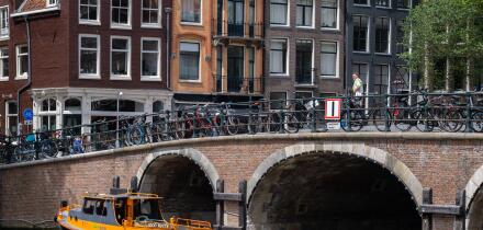 Amsterdam, The Netherlands - 21 June 2022: Old bridge in central Amsterdam