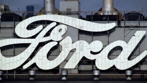 AJAXNETPHOTO. 1970S. DAGENHAM, ESSEX, ENGLAND - CAR FACTORY - ENORMOUS ICONIC BRAND NAME ON THE FORD FACTORY OVERLOOKING THE RIVER THAMES. PHOTO:JONATHAN EASTLAND/AJAX. Image shot 1972. Exact date unknown.