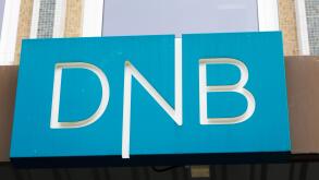 Trondheim, Norway - September 26, 2015: Close-up of the sign at the DNB office entrance. DNB is a Norwegian financial services group.