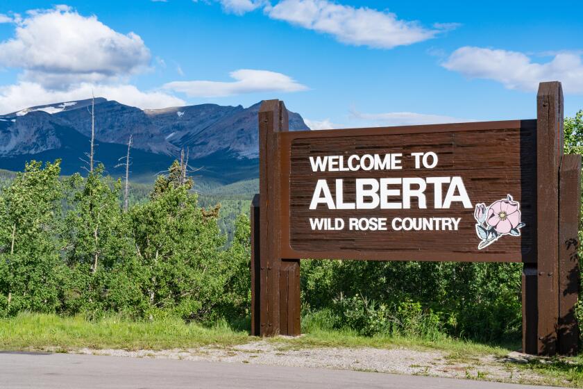 WATERTON, CANADA - JULY 1, 2018: Welcome  Alberta, Canada Wild Rose County along the United States - Canada Border