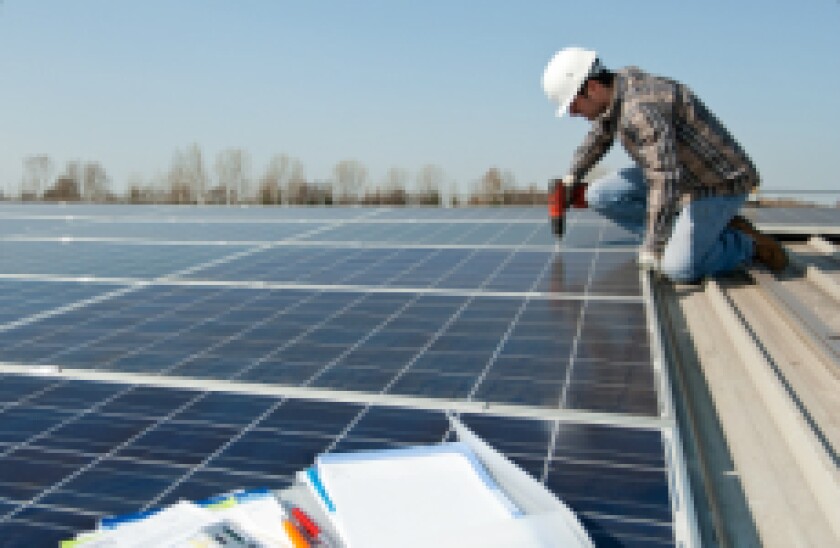 Fotolia Solar Panel Installation 230x150