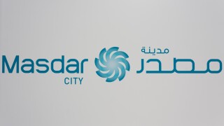 Sign for the carbon free city of Masdar City in English and Arabic, near Abu Dhabi in the UAE