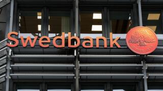 Nordic-Baltic banking group based in Stockholm, Sweden, offering retail banking, asset management, financial and other services Swedbank AB logo seen in Lindholmen Science Park, Gothenburg.