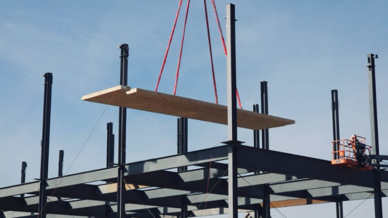 A beam of CLT wood being put in place during construction of one of Microsoft's wooden data centres in Virginia