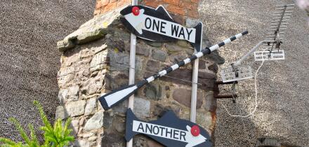 Sign on cottage in Porlock Weir, Somerset, one way oar another.