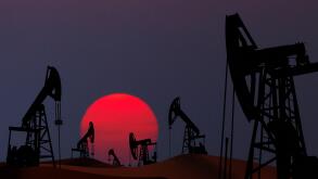 Oil pumps silhouette at  sunset