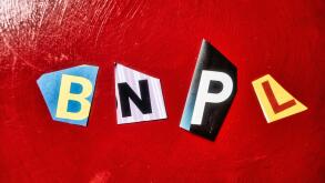 The acronym BNPL is short for "Buy Now Pay Later" and is spelled out in ransom note style typography, USA