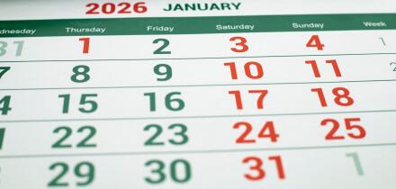 January 2026 calendar page with highlighted weekend days close view on table