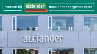 Arnhem, The Netherlands - October 1, 2025: Office of Alliander Energy with the Dutch text for "Working at alliander makes the energy network better"