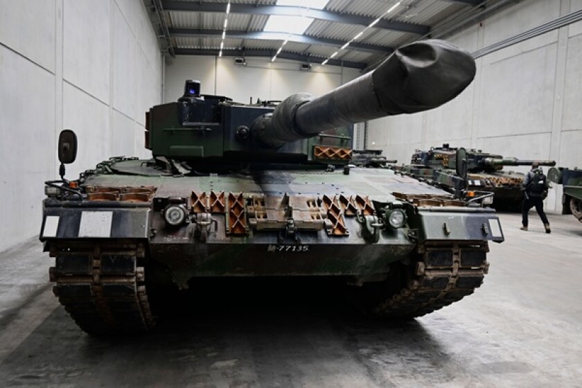 A view of a Leopard 2 tank at a production line as German Chancellor Olaf Scholz and Defence Minister Boris Pistorius visit the future site of an arms factory where weapons maker Rheinmetall plans to produce artilleries from 2025, in Unterluess, Germany,