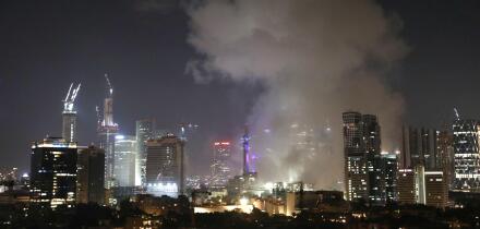 (250613) -- TEL AVIV, June 13, 2025 (Xinhua) -- Smoke rises following an Iranian missile attack in Tel Aviv, Israel, on June 13, 2025. Dozens of missiles were fired from Iran into Israel on Friday evening, according to statements issued by the Israel Defe