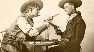 Cowboy Card Game Ends in Standoff. Image shot 1910. Exact date unknown.
