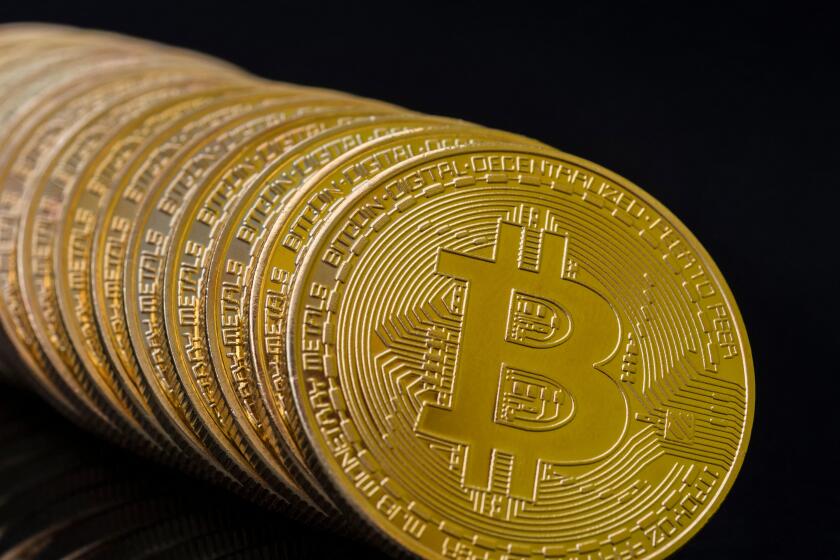 Gold coloured Bitcoins. the cryptocurrency which has made spectacular gains in 2017, then 2018 bitcoin price crash.