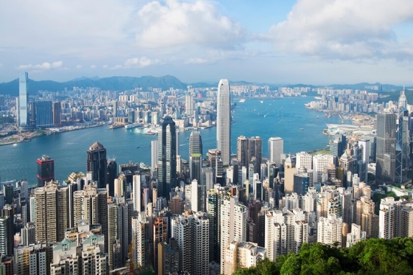 Daytime skyline of Hong Kong and Victoria Harbour from The Peak on a clear day from Alamy 30Jan23