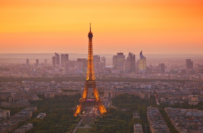 Paris skyline at sunset showing the Eiffel tower and surrounding areas Paris France EU Europe