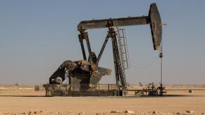 Crude oil drilling well pumping the black gold out of the soil of the Sultanate of Oman in the middle east