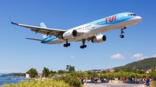 Skiathos, Greece ? July 30, 2019: TUI Boeing 757-200 airplane at Skiathos airport (JSI) in Greece.