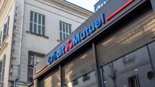 A view of Credit Mutuel Bank front store facade view with logo and signage