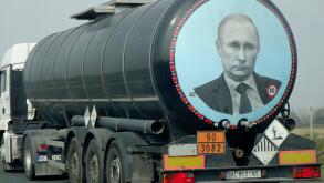 A large tank truck (Serbian licence plate) with image of Vladimir Putin on its rear, drives along the high way through Croatia.