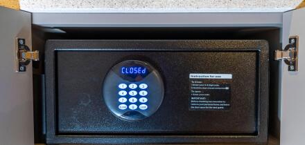 Room safe in a hotel, keypad for entering a 6-digit numerical code to lock the safe in order to deposit valuables